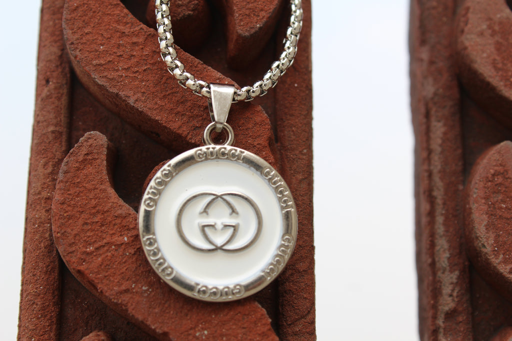 The Status Disc Pendant