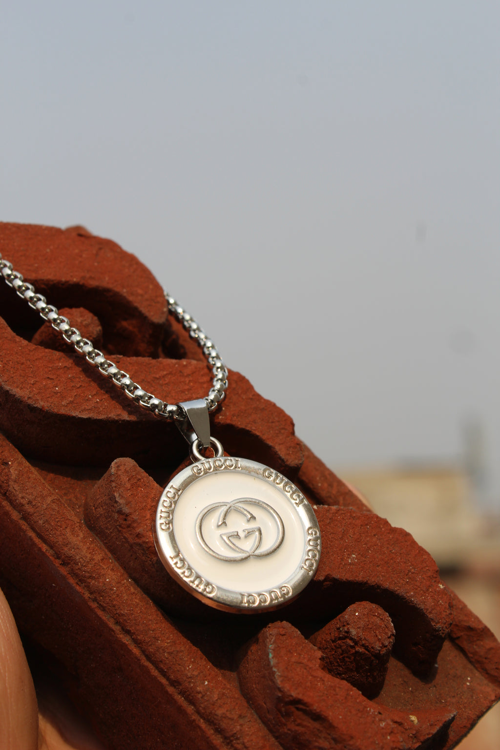 The Status Disc Pendant
