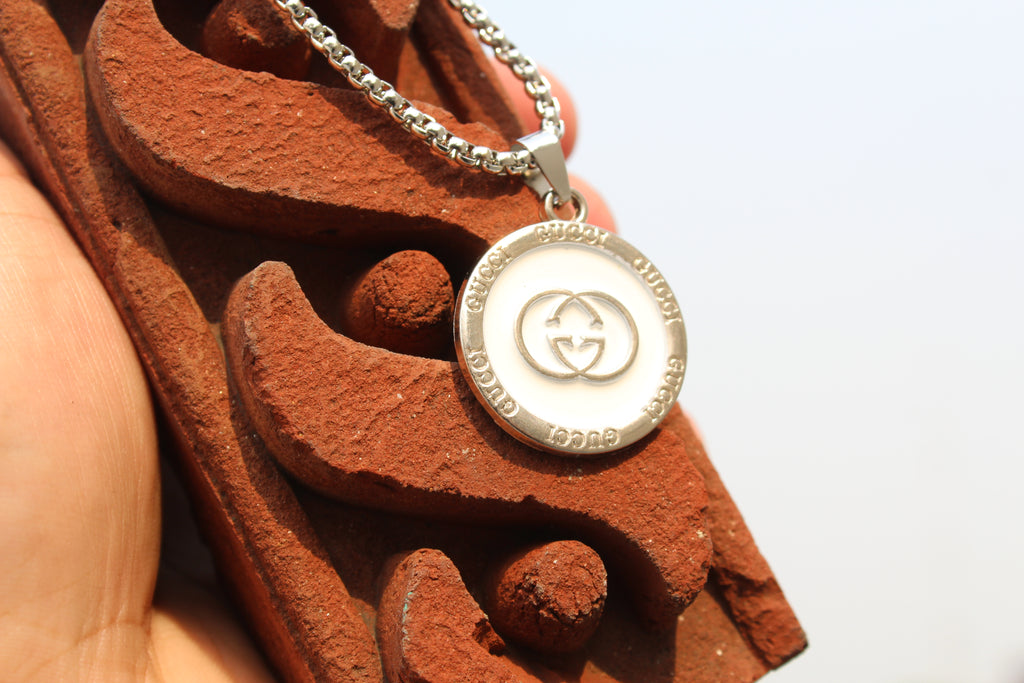 The Status Disc Pendant