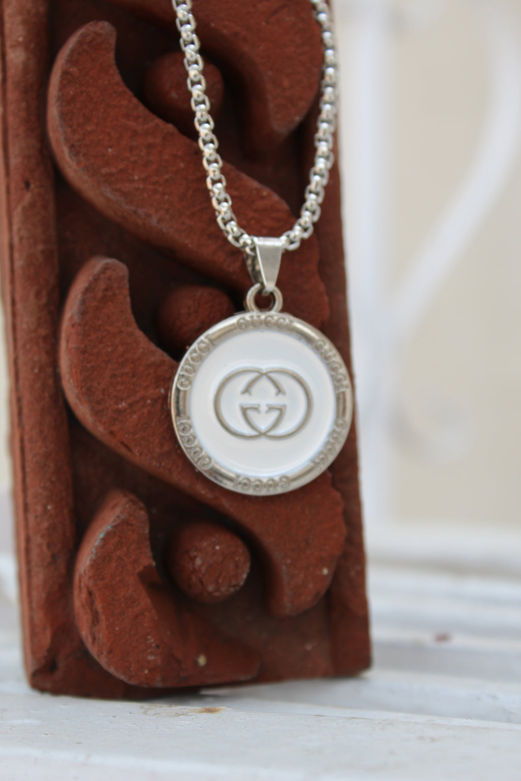 The Status Disc Pendant