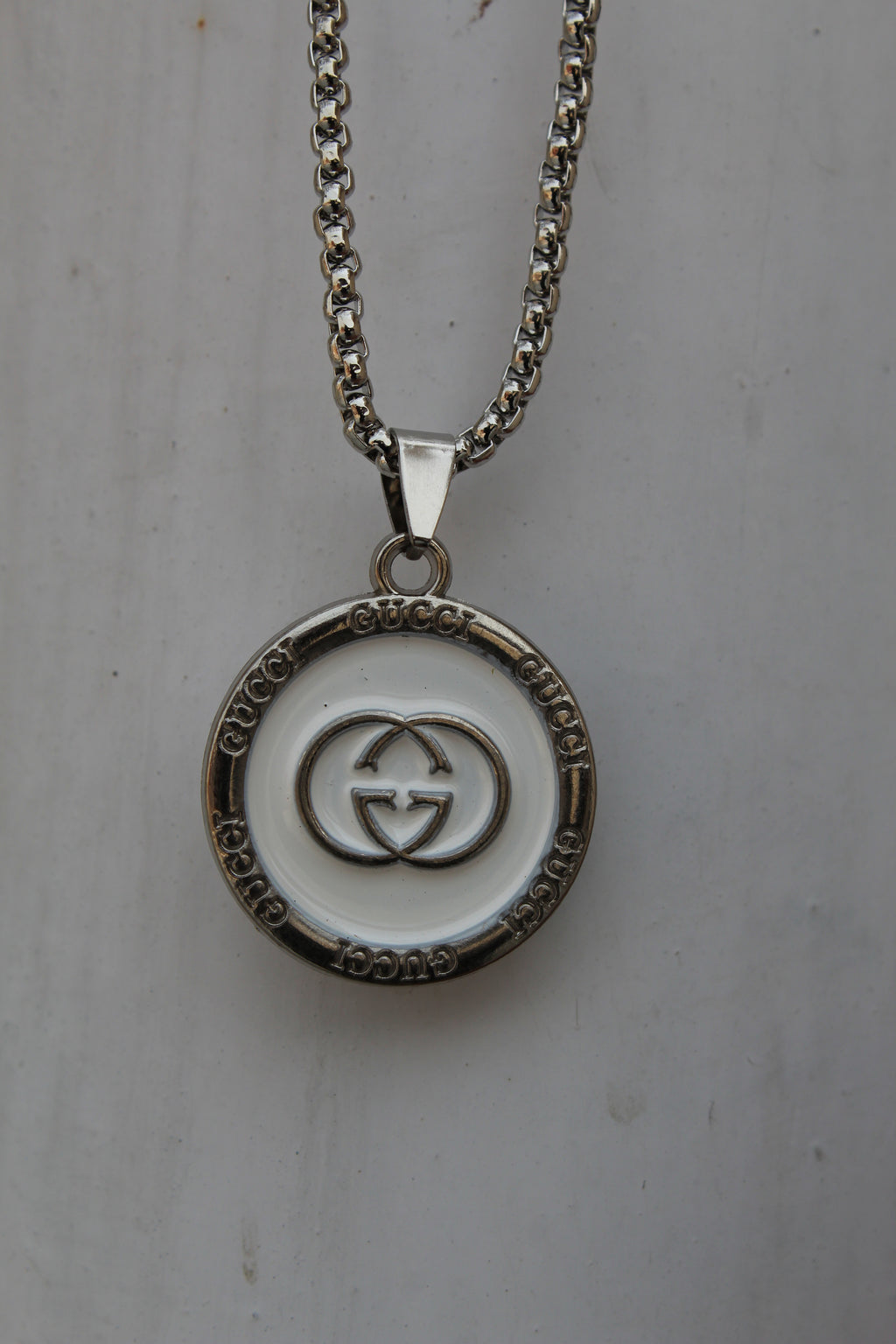 The Status Disc Pendant